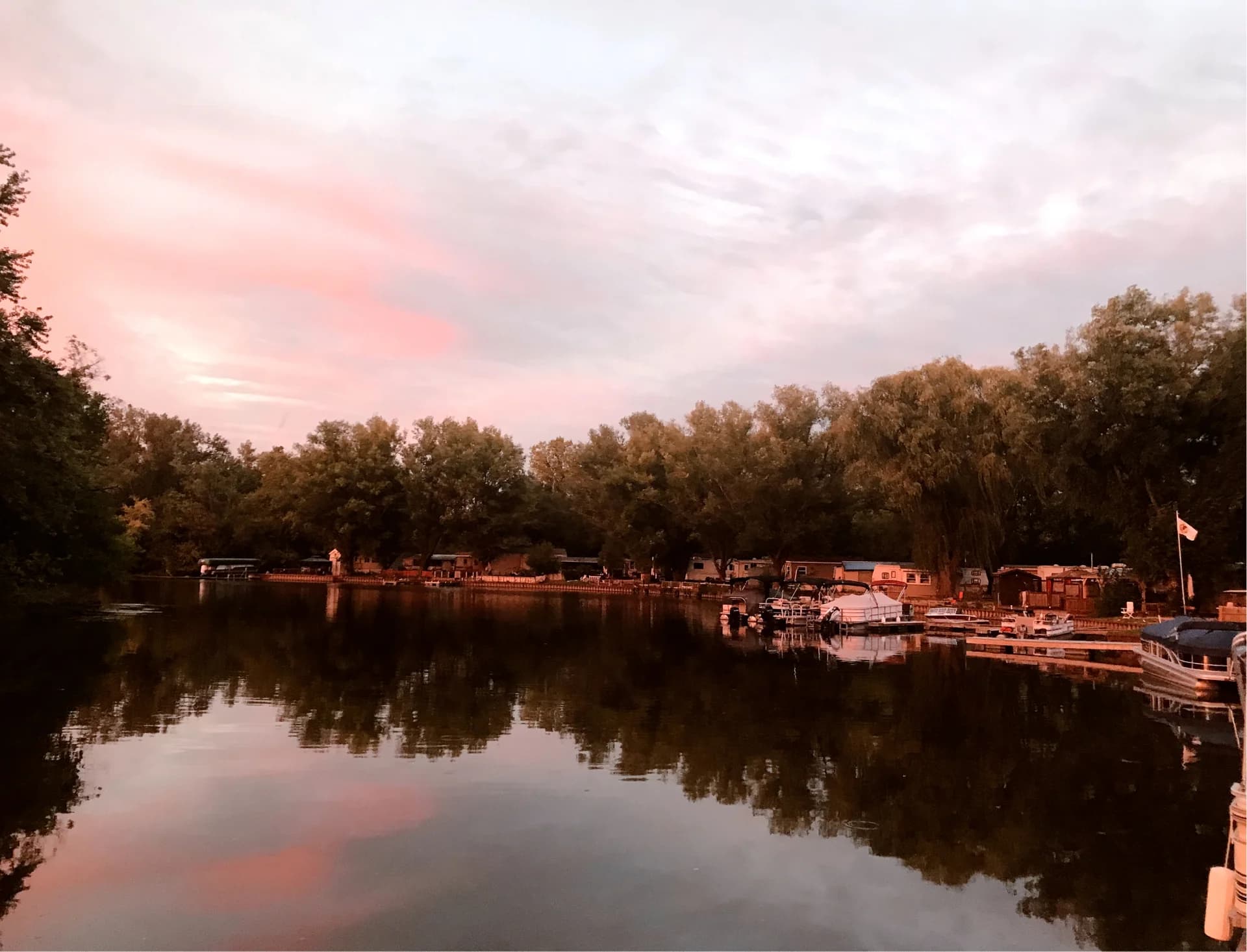 A pink sunset reflected in the Fox River