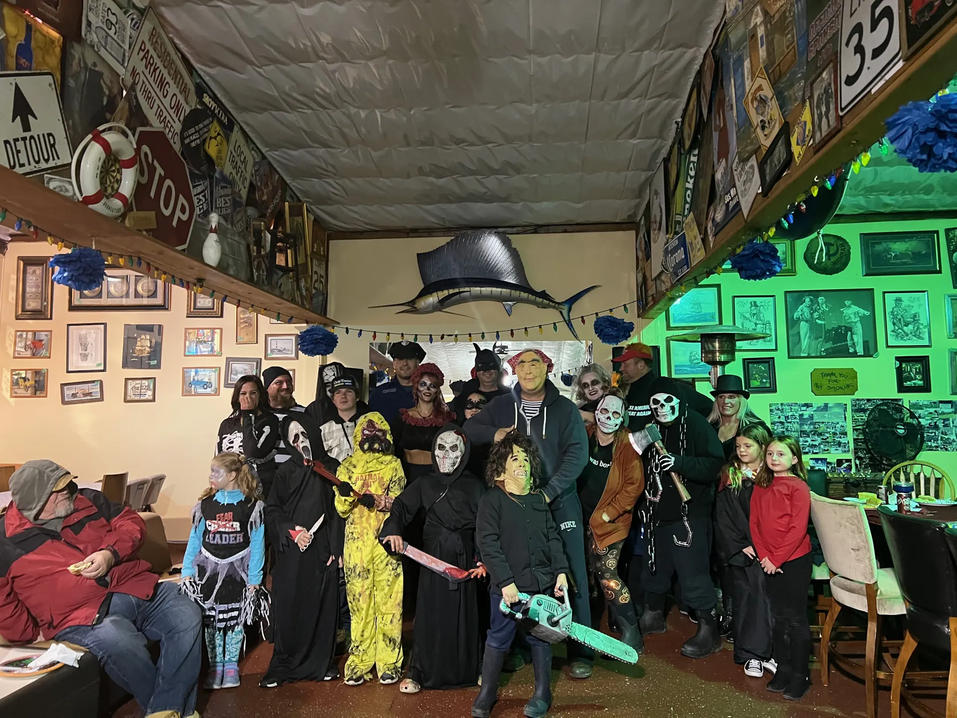 Campers in costume at the Halloween party in the lodge